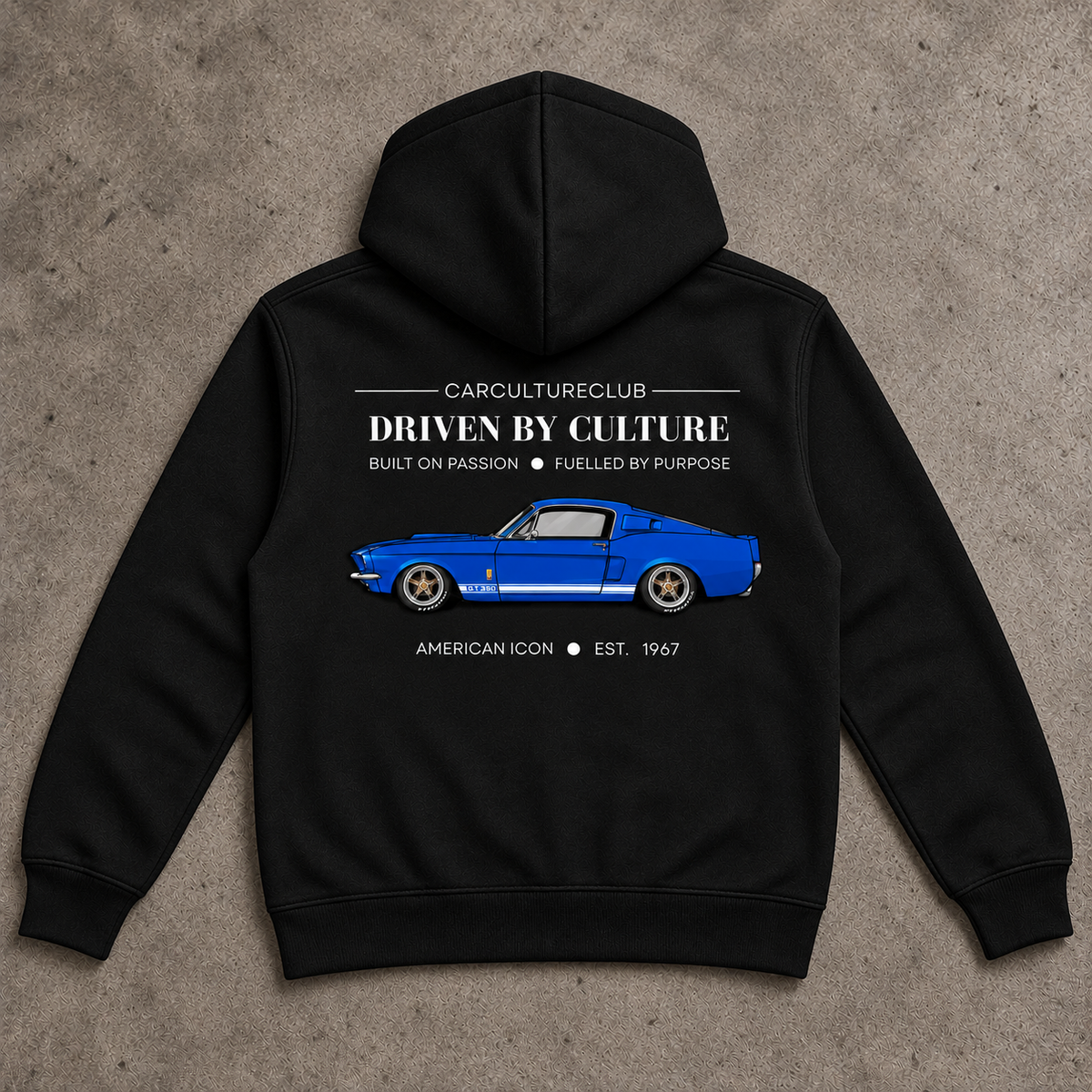 American Icon Hoodie — Black, full back flat lay on stone