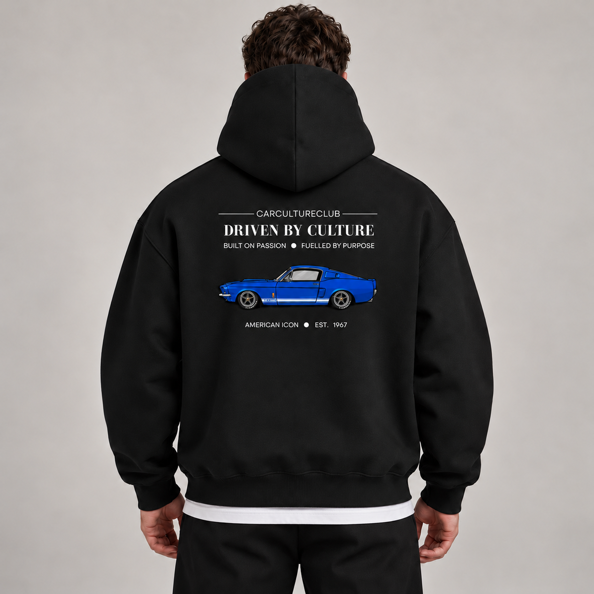 American Icon Hoodie — Black, studio view with white T-shirt layer