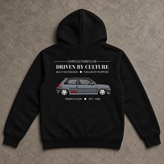 French Icon Hoodie — Black, full back flat lay on stone