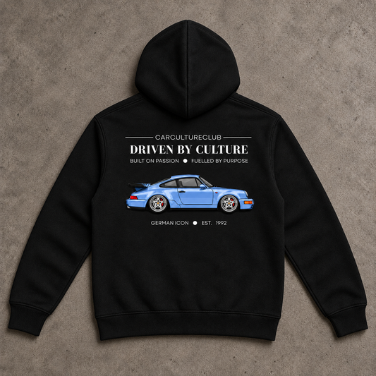German Icon Hoodie — Black, full back flat lay on stone