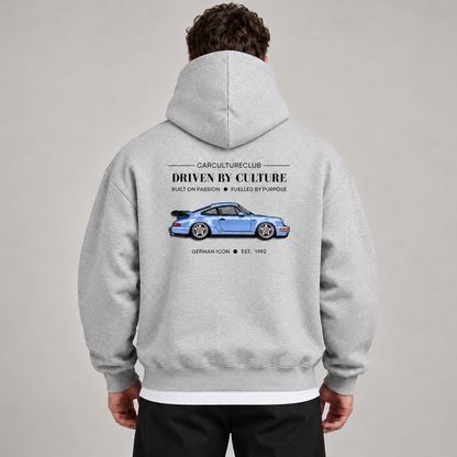 German Icon Hoodie — Grey, studio view with white T-shirt layer