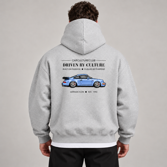 German Icon Hoodie — Grey, studio view with white T-shirt layer