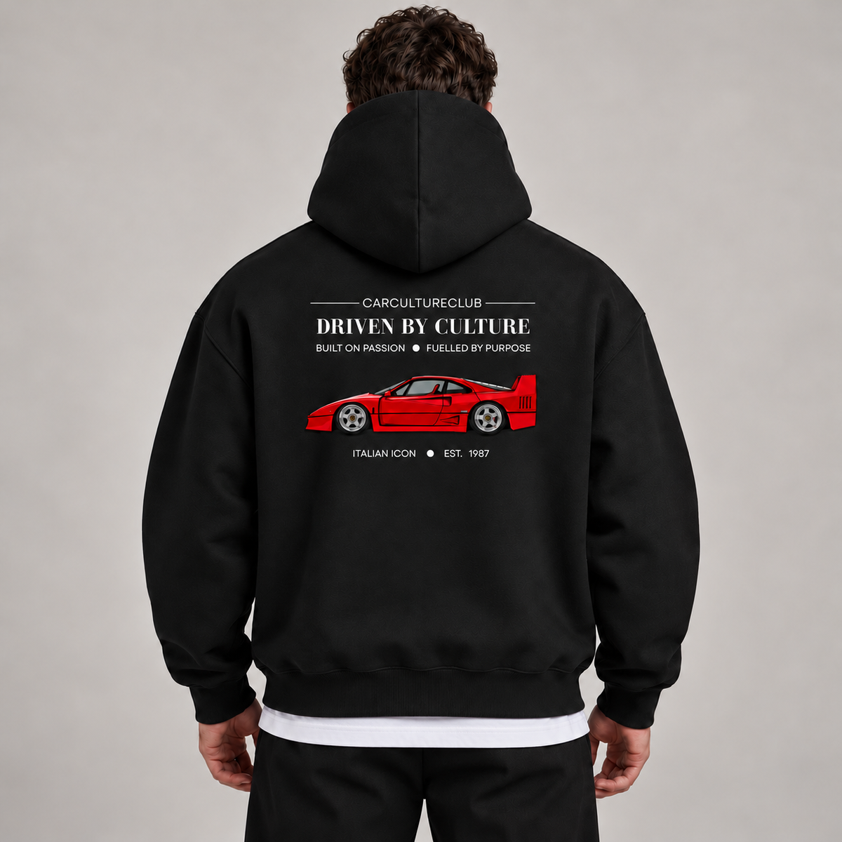 Italian Icon Hoodie — Black, studio view with white T-shirt layer